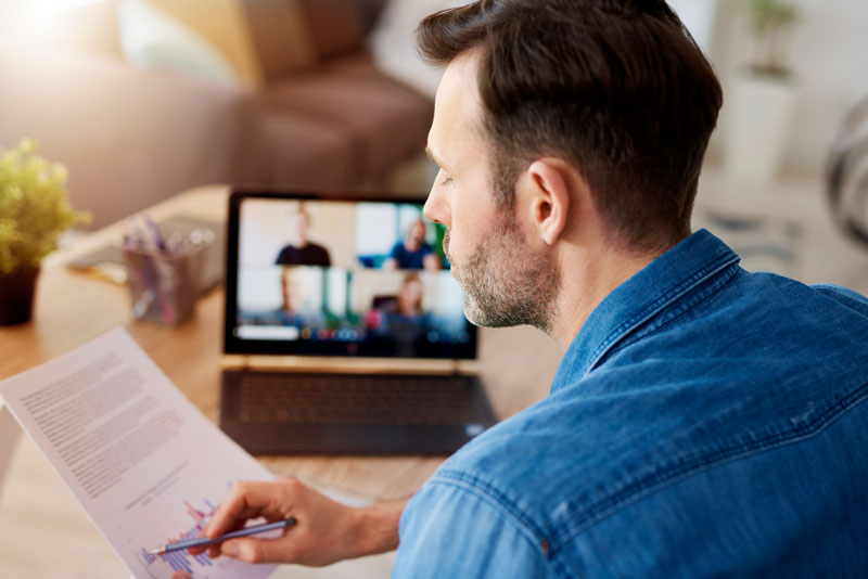 engineering contractor analyzing data during virtual meeting