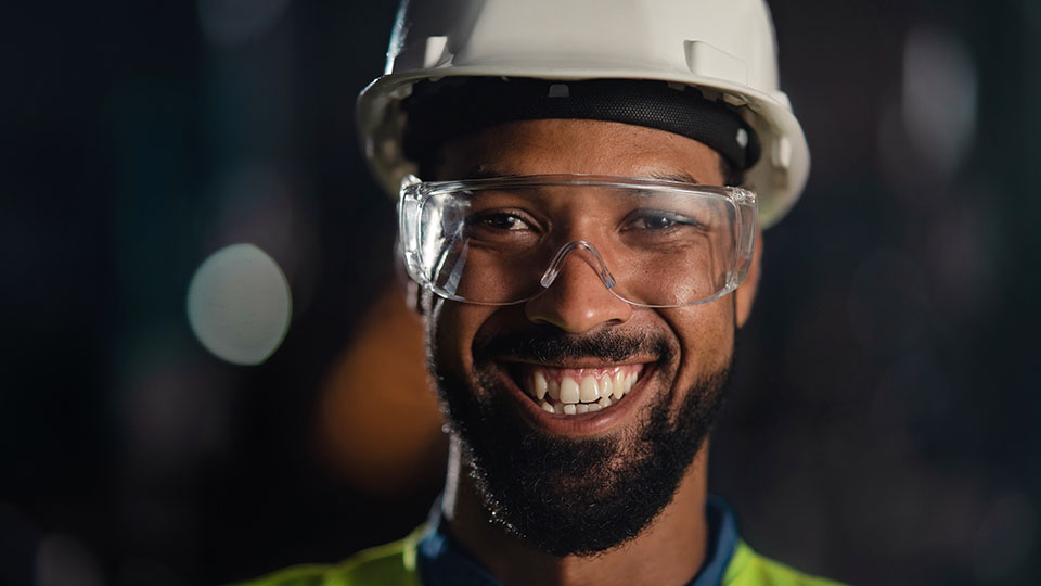 Engineering Consultant With Safety Glasses And Hard Hat